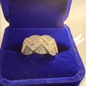 14K marked yellow gold. Ring is Size 6. Stones are CZ